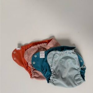 Like new Esembly diaper covers size 1 for 7-10 lbs